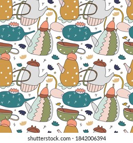 Seamless vector pattern with colorful teapots. Doodle cartoon style teapots. Kitchen pattern