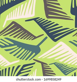 Seamless vector pattern colourful abstract cut shapes of tropical leaves mosaic ornament in pastel blue colours. Can be used for printing on paper, stickers, badges, bijouterie, cards, textiles. 