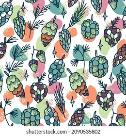 Seamless vector pattern with cones and spruce branches. Ornament with bright colors and winter mood. Perfect for New Year's gift wrapping.