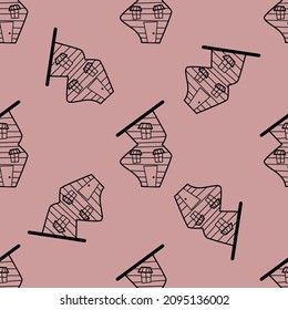 Patrón vectorial sin foco de casas de contorno en estilo doodle sobre fondo rosa.