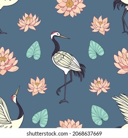 Seamless vector pattern of cranes, lotuses and water lilies. Decoration print for wrapping, wallpaper, fabric, textile.