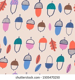 Seamless vector pattern: cute acorns. For autumn greeting cards, t-shirt prints, birthday, scrapbook, wallpaper, gift paper, pattern fills. Fashion baby print in orange, pink, green and blue colors.