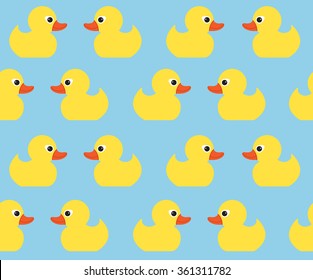 Seamless vector pattern with cute bright yellow ducks. Duck toy baby shower illustration. For cards, invitations,  backgrounds and scrapbooks, wallpapers