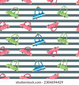 Seamless vector pattern. Cute cars and gray stripes. 
