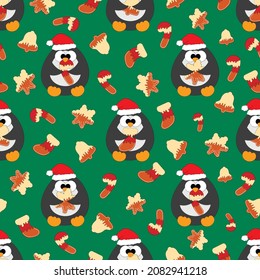 Seamless vector pattern with cute cartoon penguin and gingerbread