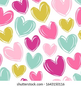 Seamless vector pattern with cute colorful hearts.