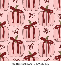 Seamless vector pattern with cute coquette pumpkins with burgundy bows. Pink halloween symbols on background. Autumn vegetables texture for wallpaper, wrapping paper, textile design