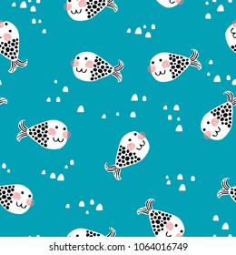 Seamless vector pattern with cute decorative fishes. Vector seamless pattern. Creative nursery background. Perfect for kids design, fabric, wrapping, wallpaper, textile, apparel