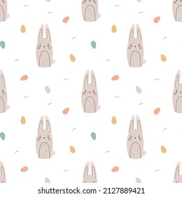 Seamless vector pattern with cute hand drawn bunny and colorful eggs. Easter theme background for kids room decor, nursery art, card, gift, fabric, textile, wrapping paper, wallpaper, packaging.