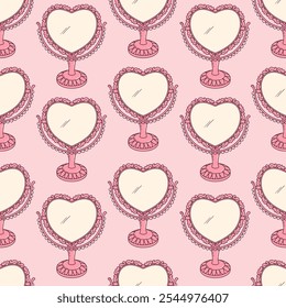 Seamless vector pattern with cute heart shaped double-sized table mirror in pink color. Make up routine background. Vintage ornate girly texture. Coquette wallpaper, wrapping paper, textile design