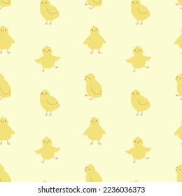 Seamless vector pattern with cute little chickens on a yellow background.Childish endless spring easter ornament.