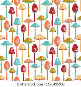 Seamless vector pattern with cute mushrooms.