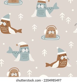 Seamless vector pattern with cute seals. Can be used for wallpaper, pattern fills, web page background, surface textures, gifts. Creative Hand Drawn textures for winter holidays on beige background