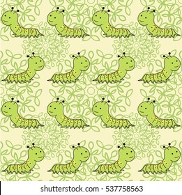 Seamless vector pattern. Cute small caterpillars on the green leaves background. 