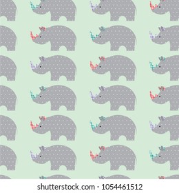 Seamless vector pattern with cute textile rhinoceroses