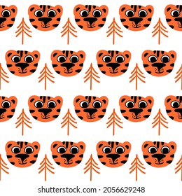 Seamless vector pattern with cute tigers heads and Christmas trees. Template for printing fabric and wrapping paper.