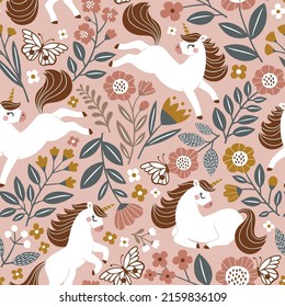 Seamless vector pattern with cute unicorns on floral background. Perfect for textile, wallpaper or print design. 