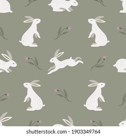 Seamless vector pattern with cute, white rabbits on floral background. Perfect for textile, wallpaper or print design. 