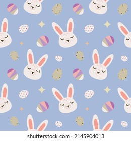 Seamless vector pattern with cute white rabbits with eggs. Perfect for textile, wallpaper or print design.