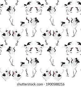 Seamless vector pattern with dancing cranes.