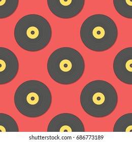Seamless vector pattern. Dark grey and yellow vinyls on light red background.