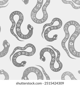 Seamless vector pattern decorated snake with Ukrainian embroidery, the animal symbol of 2025. Simple doodle style. Grid