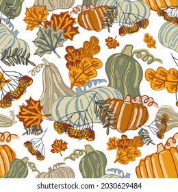 Seamless vector pattern of decorative autumn botanicals pumpkins and leaves in pastel orange and green tones. Perfect for decorations, textiles, advertisements, surfaces, wrapping paper