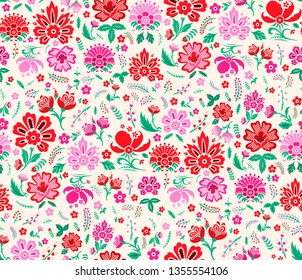 Seamless vector pattern. Decorative floral template. Green background with multicolor leaves and flowers. Pattern for fabric and textile. Spring summer field of flowers wallpaper.