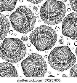 Seamless vector pattern of decorative seashells isolated on white background. Zentangl. Boho style.