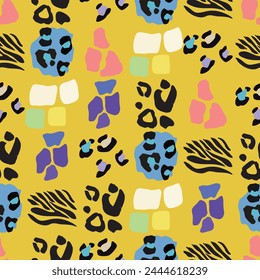 Seamless vector pattern. A design featuring a colorful leopard and zebra print background. This textile art combines patterns in green blue and pink hues, creating a visually striking art
