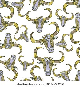 Seamless vector pattern design of ornamental cute lined bull heads in lines in pastel colors on white background symbol taurus sign. The design is perfect for backgrounds, textiles, wrapping paper