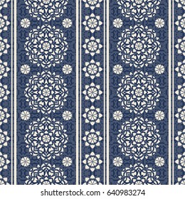 Seamless vector pattern for design and print. Beige ornament with stripes on a blue background