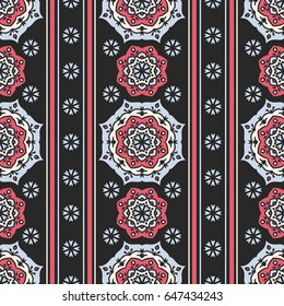 Seamless vector pattern for design and print. Bright ornament with an abstract floral motif and stripes in a palette of blue, pink and beige on a dark gray background