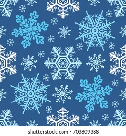 Seamless vector pattern with detailed snowflakes. Nice vector background, perfect for wallpaper, wrapping paper or textile.