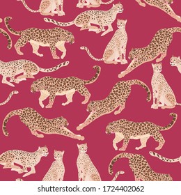Seamless vector pattern with different big spotted cats - jaguars and leopards, on red color background. Square template with predators for fabric and wallpaper.