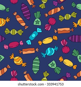 Seamless vector pattern of different colored candies on a blue background, hand-drawn.