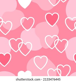Seamless vector pattern with different hearts, pink background
