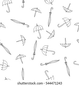 Seamless vector pattern with different umbrellas for textile, ceramics, fabric, print, cards, wrapping