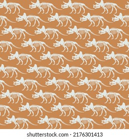 Seamless vector pattern with dinosaur skeleton. 