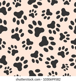Seamless vector pattern of dog paw track. Pawprints. Animal footprint background.