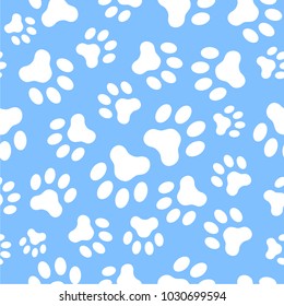 Seamless vector pattern of dog paw track. Pawprints. Animal footprint on blue background.