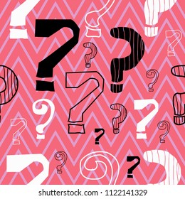 Seamless vector pattern with doodle questions marks background