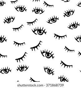 Seamless vector pattern - drawn by hand ink illustration of open and closed eyes. 