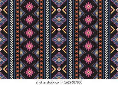 Seamless vector pattern in ethnic style. Geometric vertical ornament with oriental motifs. Stylish design for textiles.