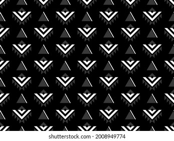 Seamless vector pattern in ethnic style. Geometric ornament with folk motives. Textile design. 