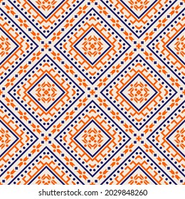 Seamless vector pattern in ethnic style. Background with geometric ornament for printing on paper and textile.
