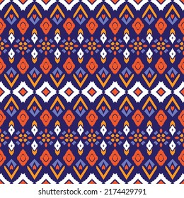 Seamless vector pattern in ethnic style. Ikat design for paper, textiles, surfaces. Geometric ornament with folk motifs of Maya, Aztecs, Indians, Mexicans, Peruvians.