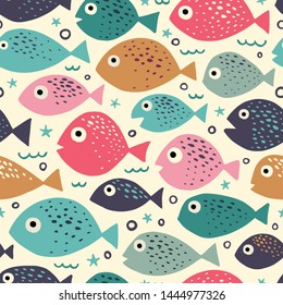Seamless vector pattern with exotic fish on a beige background.
