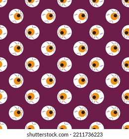 Seamless vector pattern with eyeballs on a violet background. Cartoon texture for halloween.