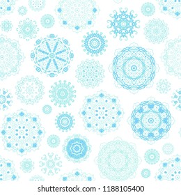 Seamless vector pattern with falling snowflakes